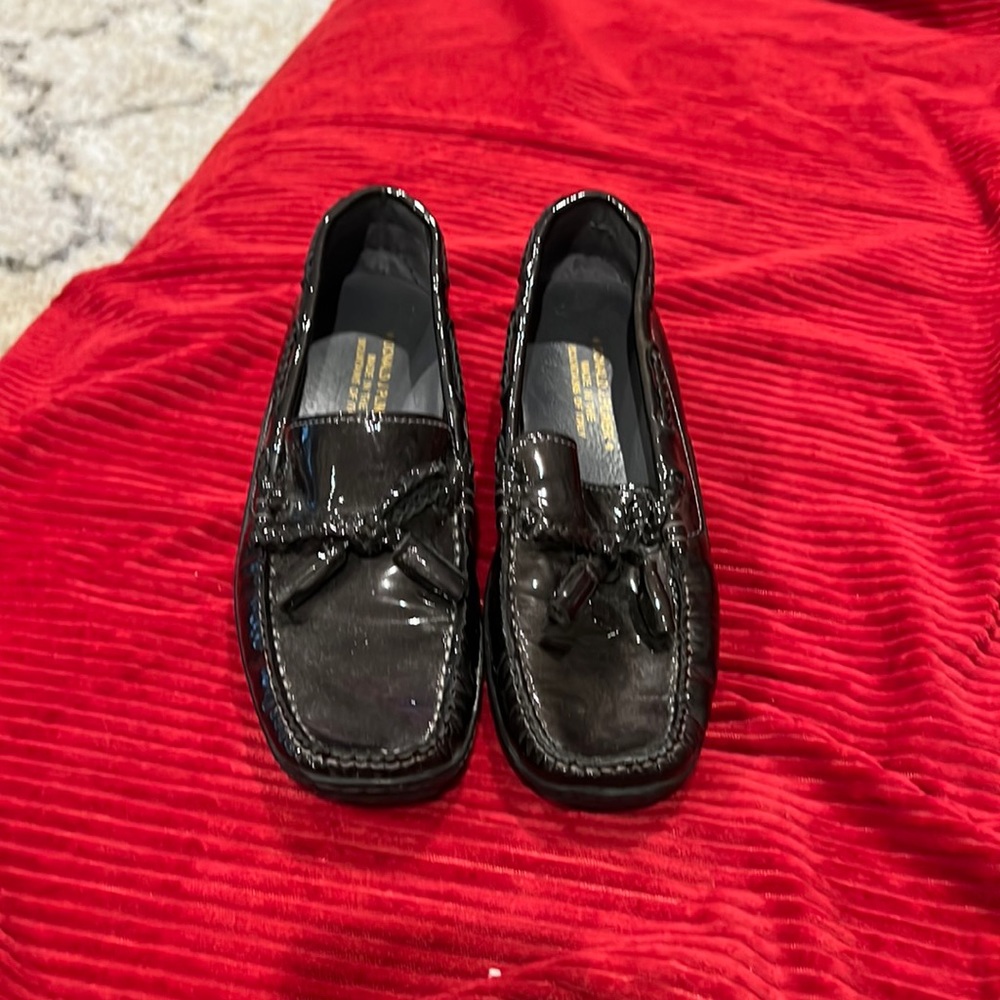 Donald J Pliner black patent leather loafer.